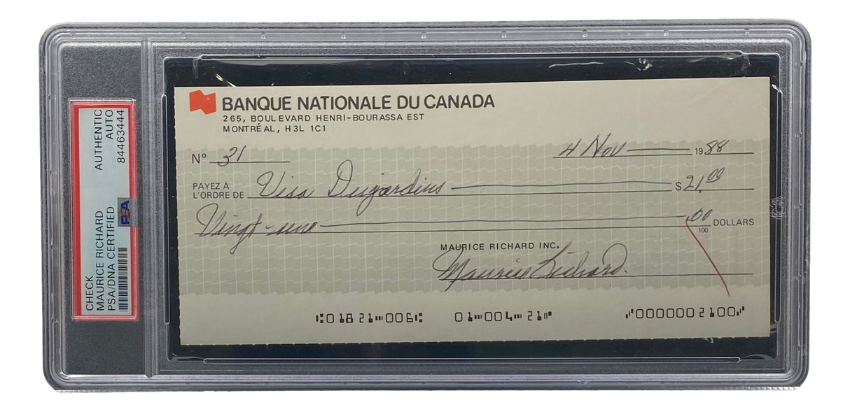 The Sports Integrity Maurice Richard Signed Montreal Canadiens Bank Check #31 features his autograph, is made out to “Miss Disyakian,” dated Nov 14, 1984 for $2.00, and comes encased in a clear PSA/DNA authentication holder.