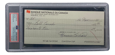 The Sports Integrity Maurice Richard Signed Montreal Canadiens Bank Check (PSA/DNA 84463446) features a signed, encased cheque with a red and white authentication label on the left side of the case.