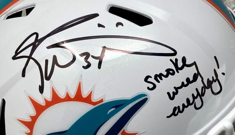 The Sports Integrity Ricky Williams Signed Dolphins FS Speed Rep Helmet features his "Smoke Everyday" inscription and signature, plus it comes with a case.