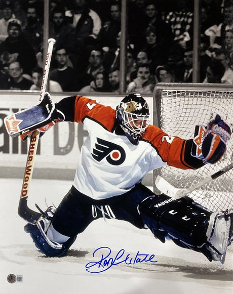 The Sports Integrity Ron Hextall Signed 16x20 Philadelphia Flyers Glove Save Photo (BAS) shows Hextall in his white, orange, and black jersey making a dramatic glove save as fans watch. His autograph appears below the image.