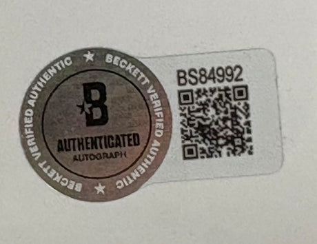 A silver Beckett sticker (code BS84992, QR code) marked B AUTHENTICATED AUTOGRAPH is attached to the Sports Integrity Ron Hextall Signed Framed 16x20 Philadelphia Flyers Save Photo.