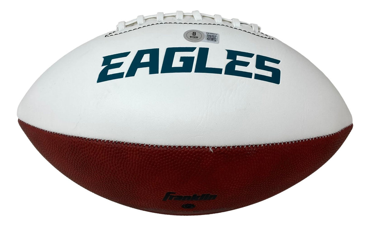 A Ron Jaworski signed Philadelphia Eagles logo football with a white top and brown bottom, displaying "EAGLES" in bold on the white panel, and made by Sports Integrity.