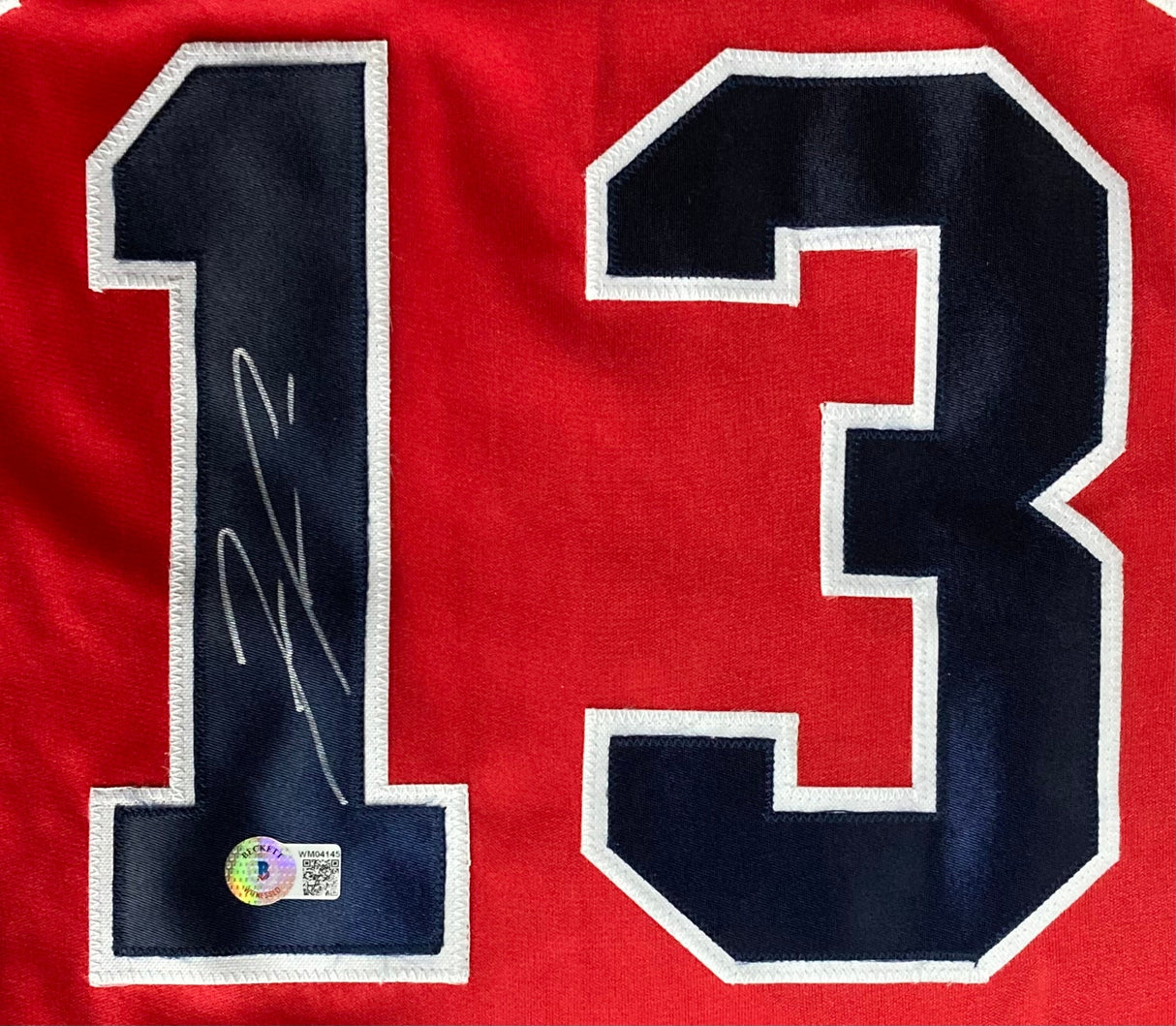 The Sports Integrity Ronald Acuna Jr Signed Custom Red Pro-Style Baseball Jersey BAS ITP features a large blue-and-white number 13 with his signature on the number 1 and an authentication sticker near the bottom.