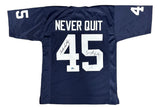 The Sports Integrity Rudy Ruettiger Sean Astin Notre Dame Blue Never Quit Jersey features white "NEVER QUIT" above #45, signatures on/near the number, and #45 on the sleeves. BAS+JSA authenticated.