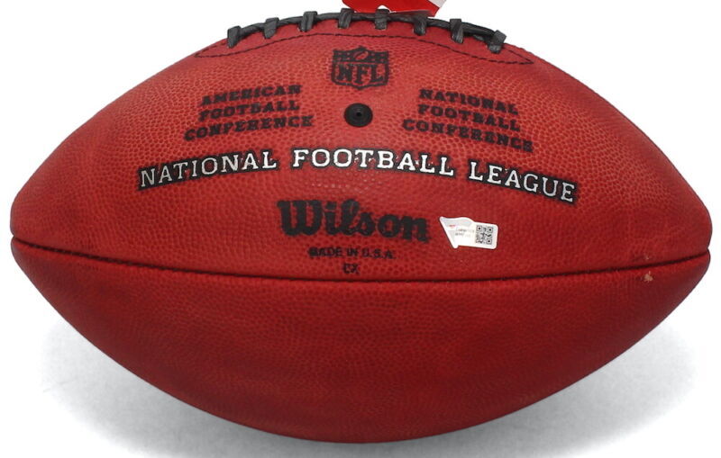 RUSSELL WILSON Autographed Seattle Seahawks Metallic Logo Official NFL Wilson Duke Football FANATICS