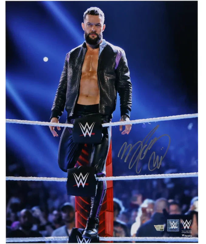 Finn Balor Autographed WWE Sitting on Top Turnbuckle with Jacket On 16" x 20" Photograph Fanatics