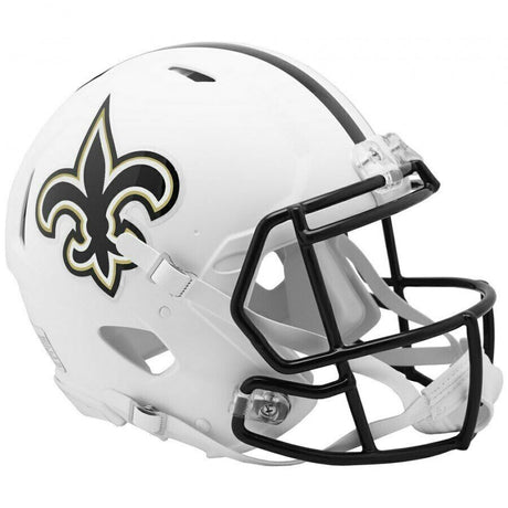 The Sports Integrity New Orleans Saints Full Size Flat White Authentic Speed Helmet features a black facemask and a gold and black fleur-de-lis logo, representing the NFL team.