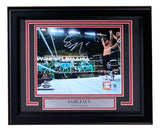 The Sports Integrity Sami Zayn Signed Framed 8x10 WWE Photo from Fanatics features the superstar celebrating in the ring, complete with a silver nameplate and WWE logo beneath the photo.