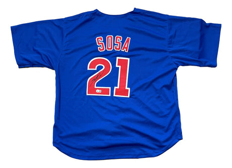 The Sports Integrity Sammy Sosa Chicago Blue "Slammin Sammy" Baseball Jersey features Sosa's name, #21 in red and white on the back, and a BAS-authenticated autograph.