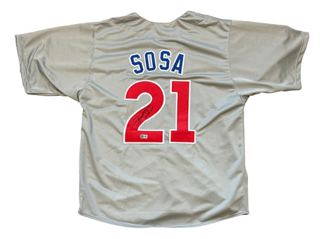 Sports Integrity Sammy Sosa Chicago Signed Gray Slammin' Sammy Baseball Jersey with "SOSA" in blue, red #21 on back, autographed on the 2. Authenticated by BAS.