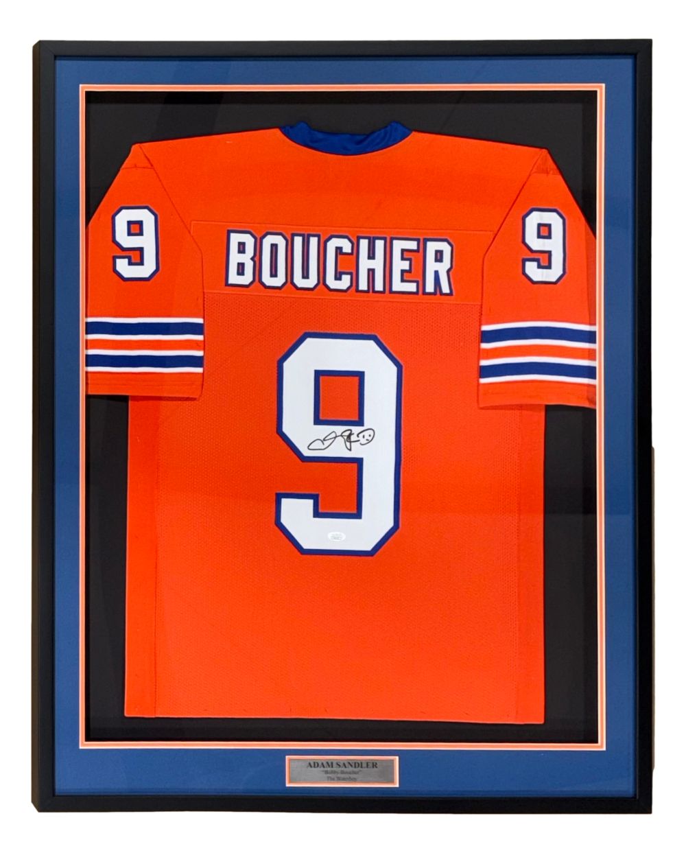 Sports Integrity Adam Sandler The Waterboy custom Boucher football jersey, framed, features orange fabric with "BOUCHER" and #9 (autographed) on the back, blue/white sleeve stripes, and a plaque at the frame's bottom. JSA certified.