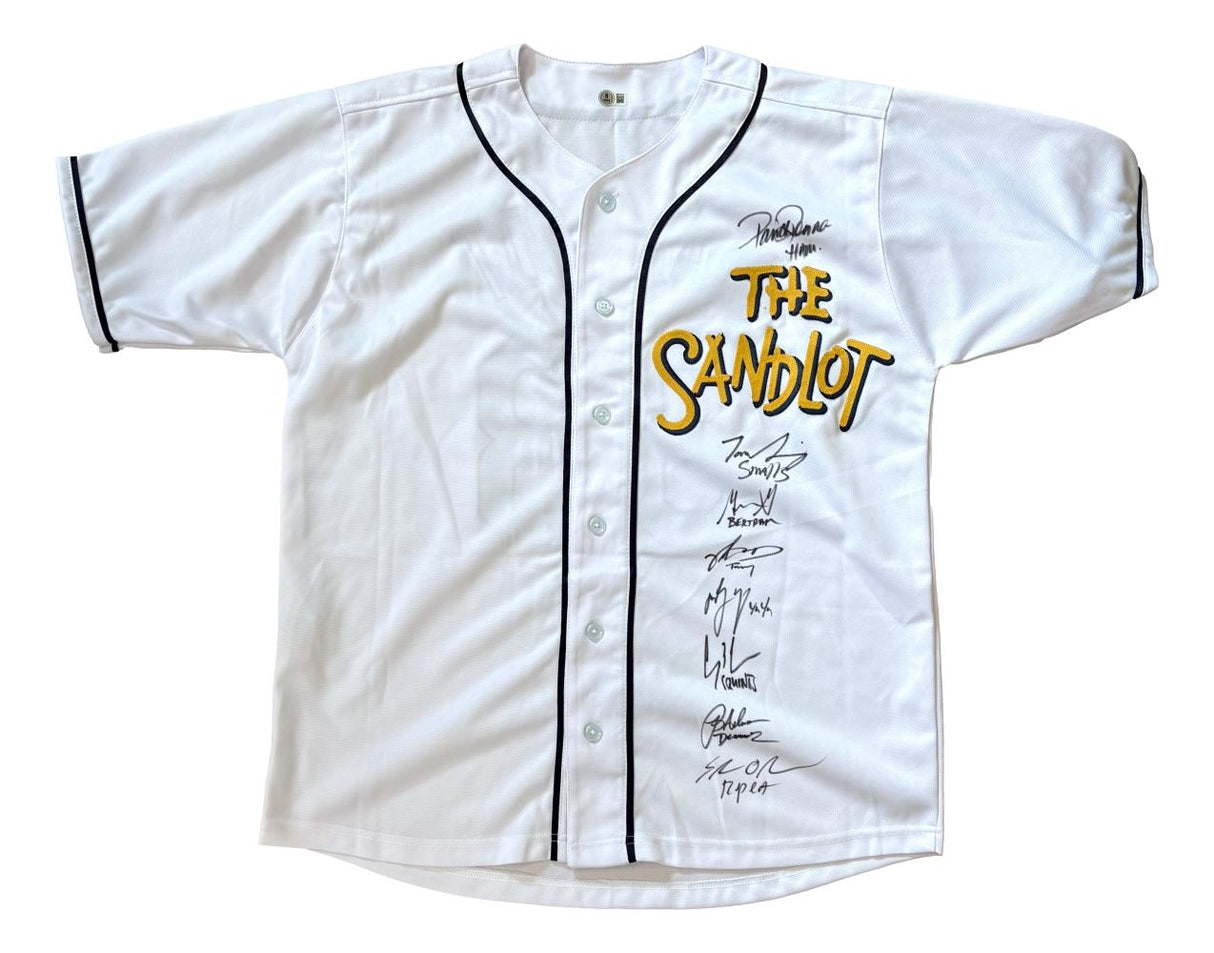 The Sandlot (8) Cast Signed Custom Baseball Jersey by Sports Integrity features a white design with black trim, The Sandlot logo in yellow and black, and eight autographs in black ink on the right chest.