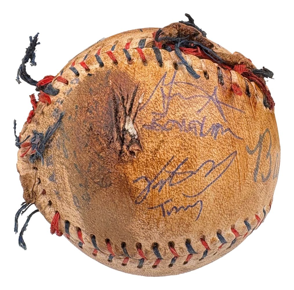 The Sandlot Cast (8) Signed Babe Ruth Replica Baseball by Sports Integrity features blue ink autographs from the cast, displayed against a white background. The leather shows signs of wear with frayed stitching and faded signatures.