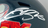 A close-up of the Saquon Barkley Signed Eagles Super Bowl 59 LIX FS Replica Speed Helmet by Sports Integrity shows a bold silver autograph above a vibrant red and yellow sticker.