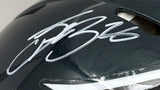 A close-up of the Sports Integrity Saquon Barkley Signed Philadelphia Eagles FS Authentic Speed Helmet, showcasing his bold silver autograph across the dark surface.