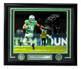 Sports Integrity Saquon Barkley Signed Framed 16x20 Eagles Kelly Green Jersey Photo, featuring Barkley running with the ball, nameplate, two Eagles logos; PSA/DNA ITP authenticated.