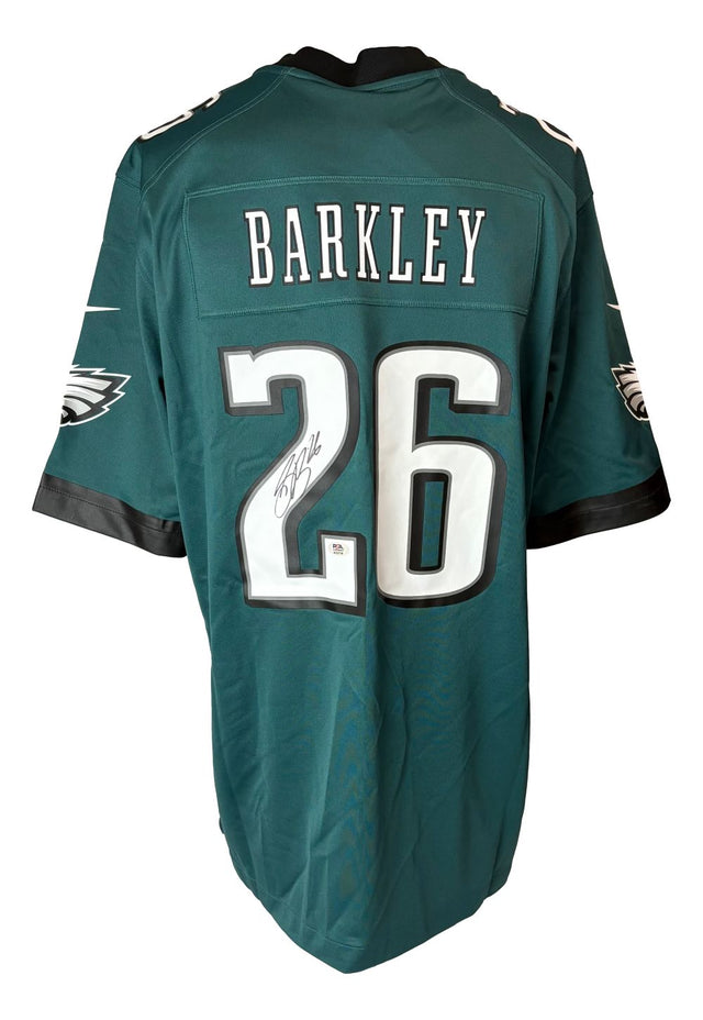 Sports Integrity Saquon Barkley Signed Philadelphia Eagles Nike Game Replica Jersey (#26), features black and white accents and Barkley's autograph on the number 2. Authenticated by PSA/DNA.