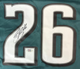 This Saquon Barkley Signed Philadelphia Eagles Nike Game Replica Jersey by Sports Integrity features large white and black-trimmed number 26. The left side of the 2 is signed in black marker, with a PSA/DNA authentication sticker below the autograph.