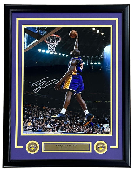 Sports Integrity Shaquille O'Neal Signed Framed 16x20 Photo features Shaq in a Lakers purple jersey (#34) dunking, with his autograph and a gold nameplate at the bottom. BAS authenticated.