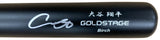A close-up of a Shohei Ohtani Los Angeles Dodgers Signed Asics Game Model Bat by Sports Integrity, featuring “GOLDSTAGE Birch,” a white signature, and Japanese characters above the brand name.