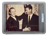 The Sports Integrity Ted Williams Stan Musial Signed Slabbed 8x10 Photo features both legends greeting each other in a vintage image, signed in gold ink and PSA graded NM-MT 8, encased in a protective display case.