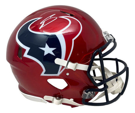 The Stefon Diggs Signed Houston Texans Red Full Size Speed Authentic Helmet by Sports Integrity features the team’s blue bull logo, black faceguard, and white chinstrap, displayed in side profile on a white background.