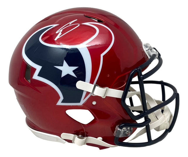 The Stefon Diggs Signed Houston Texans Red Full Size Speed Authentic Helmet by Sports Integrity features the team’s blue bull logo, black faceguard, and white chinstrap, displayed in side profile on a white background.
