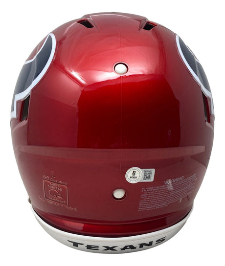 Stefon Diggs Signed Houston Texans Red Full Size Speed Authentic Helmet by Sports Integrity, shown from the back with TEXANS lettering, side team logos, and certification and warning labels near the base.