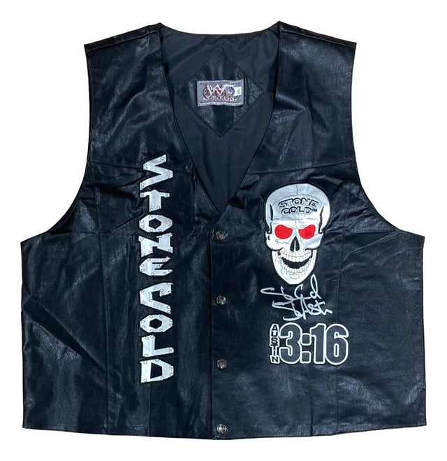 The Sports Integrity Stone Cold Steve Austin Signed Autographed WWE Skull Vest BAS is a black leather vest featuring bold "STONE COLD" text, a skull graphic with red eyes, "AUSTIN 3:16," and an authentic signature.