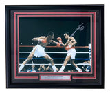 Sports Integrity Sugar Ray Leonard Signed Framed 16x20 Boxing Swing Photo BAS ITP features an autographed action shot of Leonard in the ring, with a metal plaque displaying his name.