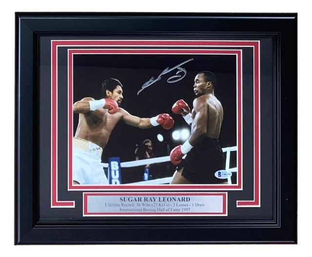 Sports Integrity Sugar Ray Leonard Signed Framed 8x10 Boxing Photo vs Roberto Duran, featuring Leonard boxing Duran and a plaque with his name and achievements.