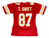 The Sports Integrity Taylor Swift Kansas City Red Ladies Football Jersey in women's size medium features yellow and white sleeve stripes, with "T. SWIFT" and the number 87 in bold white and yellow on the back.