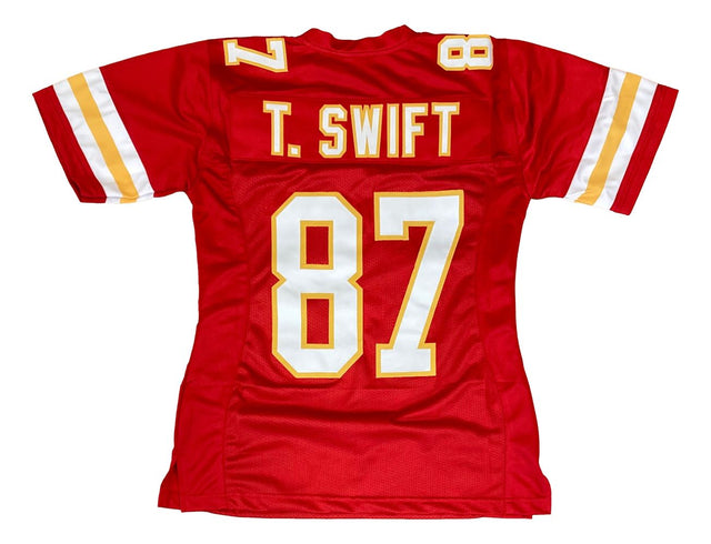 The Sports Integrity Taylor Swift Kansas City Red Ladies Football Jersey in women's size medium features yellow and white sleeve stripes, with "T. SWIFT" and the number 87 in bold white and yellow on the back.