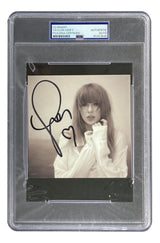 A Taylor Swift Signed RARE HEART Tortured Poets Department CD Insert by Sports Integrity, sepia-toned with PSA authentication holder and certification number.