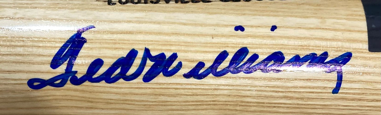 A Ted Williams Boston Red Sox signed Louisville Slugger bat by Sports Integrity features a blue cursive signature on light wood; PSA/DNA LOA included.