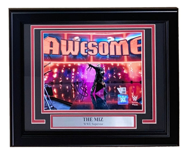 The Miz Signed Framed 8x10 WWE Photo by Sports Integrity features The Miz on stage with "AWESOME" behind him, colorful lights, his signature, and a nameplate reading THE MIZ, WWE Superstar.