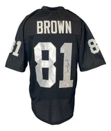 The Sports Integrity Tim Brown Oakland Signed Black Football Jersey features "BROWN" and the number 81 in white on the back and sleeves, with Tim Brown's autograph on the back number.
