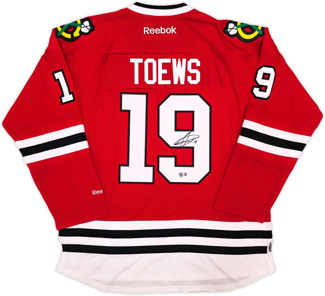 Sports Integrity Jonathan Toews Signed Chicago Blackhawks Reebok Premier Hockey Jersey BAS, featuring Toews' name and number 19 on the back with his signature.