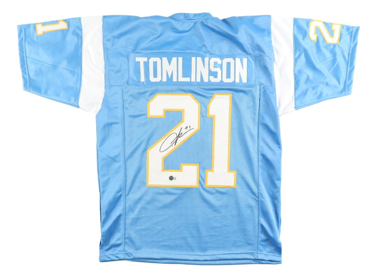 This Sports Integrity LaDainian Tomlinson San Diego powder blue football jersey features the name TOMLINSON and number 21 on the back, with the number signed in black marker. BAS authenticated.