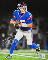 The Sports Integrity Tommy Devito Signed 8x10 New York Giants Photo (BAS ITP 1W227442) features Devito in his blue and red #15 uniform, holding a football ready to throw, with a black and white background highlighting the player in color.