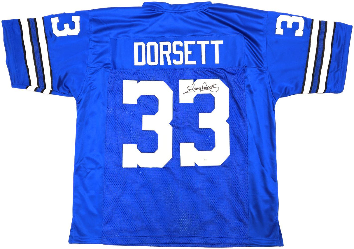 The Sports Integrity Tony Dorsett Dallas Signed Blue Football Jersey features white number 33 on front, back, and sleeves, name "Dorsett" on the back, plus an autograph above the number. JSA authenticated.