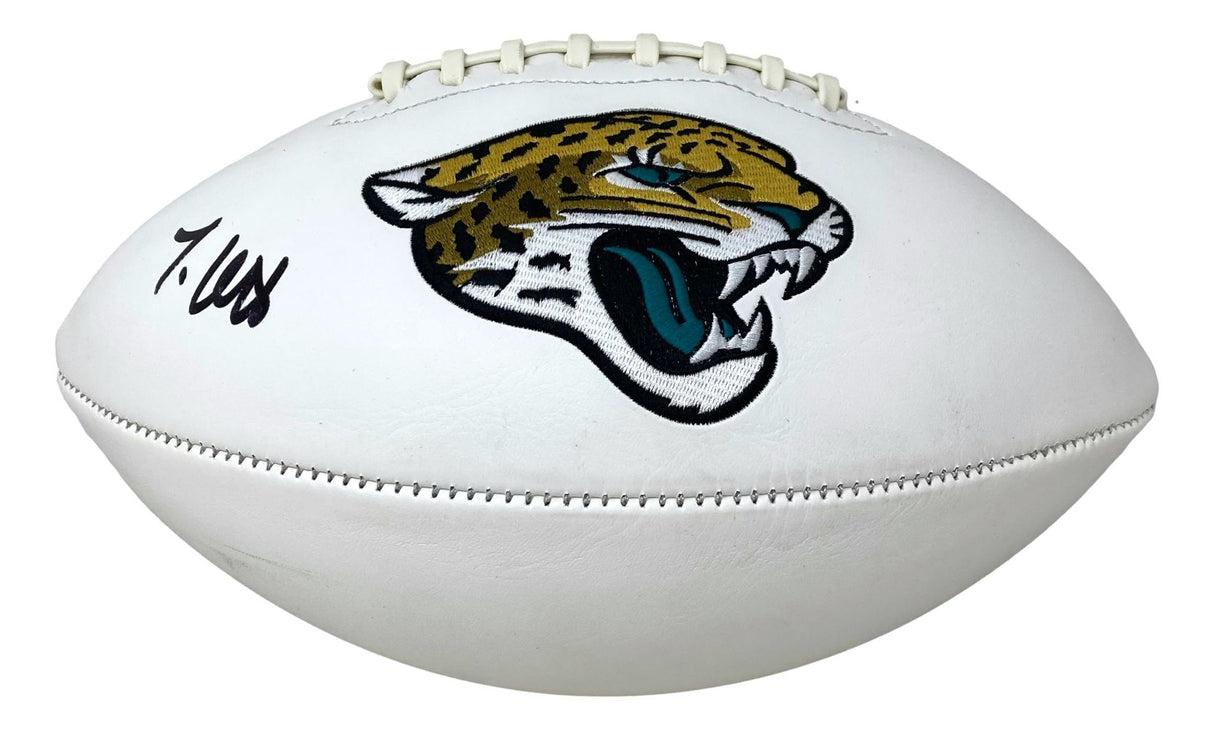 A Travis Hunter signed Jacksonville Jaguars logo football by Sports Integrity, featuring a black autograph on the left side.