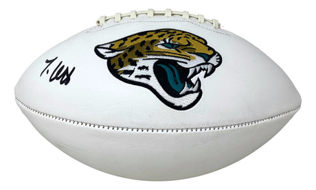 A Travis Hunter signed Jacksonville Jaguars logo football by Sports Integrity, featuring a black autograph on the left side.