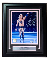 The Sports Integrity Trish Stratus Signed Framed 8x10 WWE Photo features an autograph and a plaque reading “Trish Stratus, ‘The Quintessential WWE Diva,’ WWE Hall of Fame 2013.” Available from Fanatics.