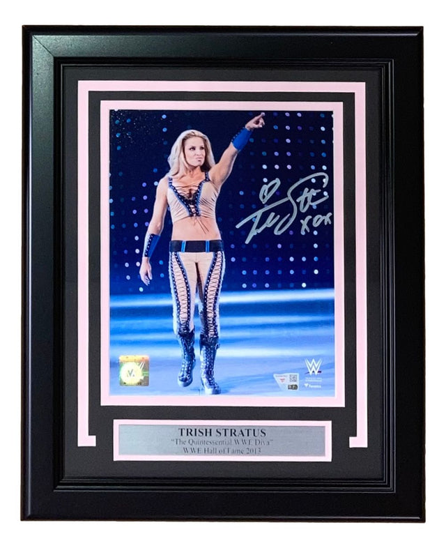 The Sports Integrity Trish Stratus Signed Framed 8x10 WWE Photo features an autograph and a plaque reading “Trish Stratus, ‘The Quintessential WWE Diva,’ WWE Hall of Fame 2013.” Available from Fanatics.