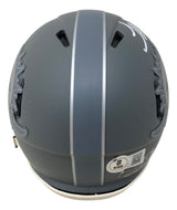The Tyreek Hill Signed Miami Dolphins Slate Mini Speed Helmet by Sports Integrity features a gray finish, white vertical stripe, vent openings, wavy side graphics, and a safety certification sticker at the back.