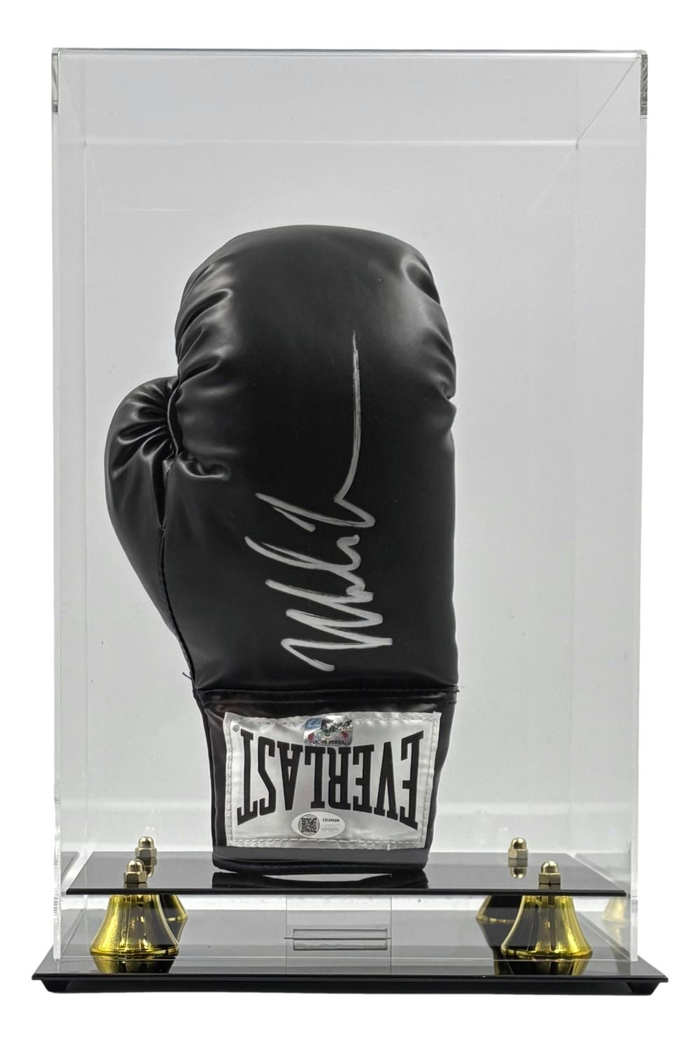 A Mike Tyson signed black Everlast right-hand boxing glove is displayed upright in a clear vertical acrylic case with gold corners and mirrored base by Sports Integrity. Authenticated by JSA QR.