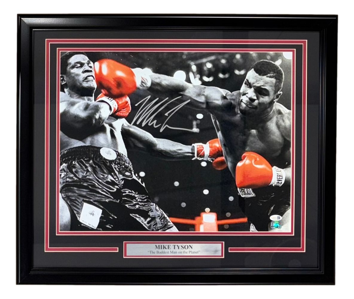 The Sports Integrity Mike Tyson Signed Framed 16x20 Spotlight Boxing Photo (JSA QR Hologram) features a black-and-white action shot with colorful red gloves, plus a plaque reading "MIKE TYSON The Baddest Man on the Planet.
