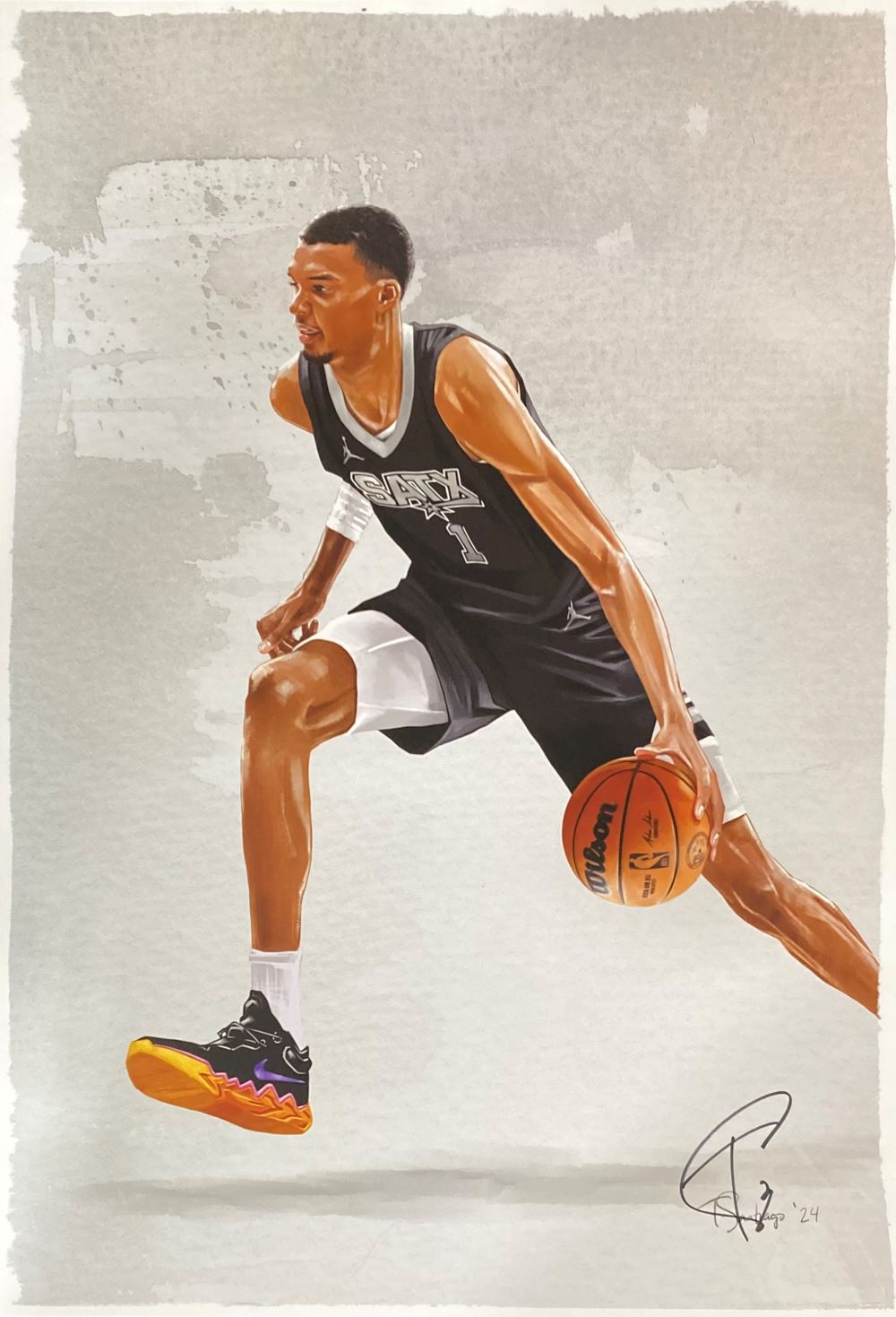 The Sports Integrity Victor Wembanyama 13x19 San Antonio Spurs lithograph features a digital painting of the player in a black uniform dribbling, mid-stride, with bright sneakers and Tony Santiago's signature at the bottom right.