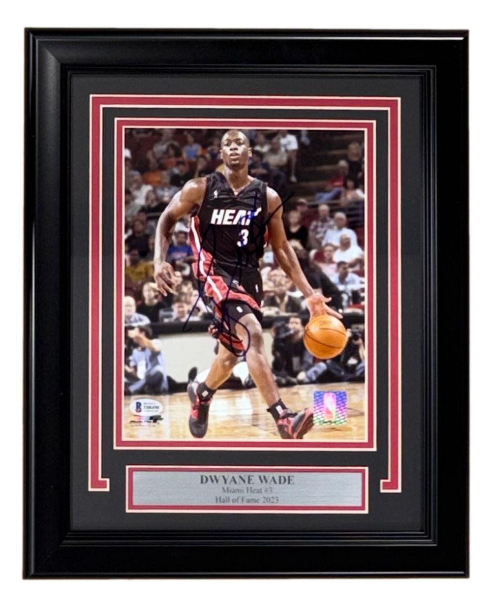 A Sports Integrity Dwyane Wade Signed Framed 8x10 Miami Heat Photo (BAS), featuring the star dribbling in his #3 jersey, displayed with a commemorative plaque.